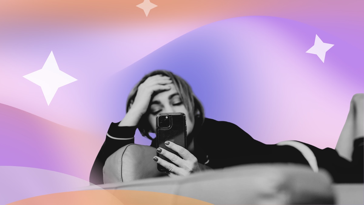 Tired woman lying on a sofa looking at her phone, set against a pink and purple gradient with sparkle accents