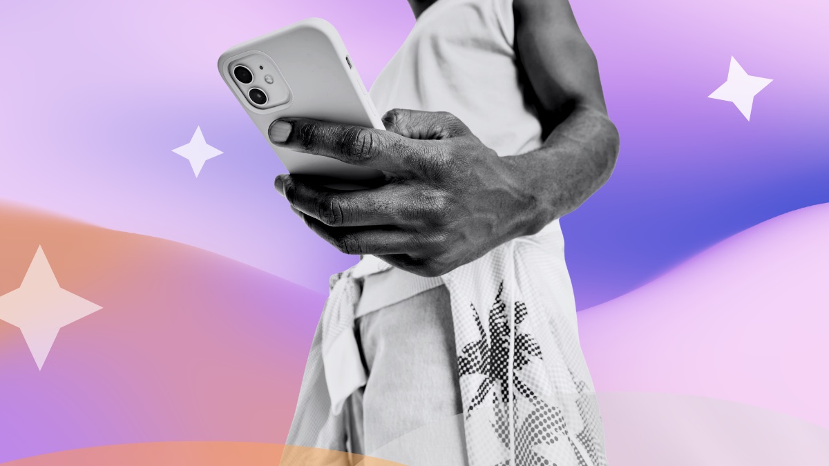 Close-up of a hand holding a white phone, set against a pink and purple gradient with sparkle accents