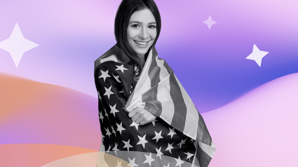 Smiling woman wrapped in an American flag, set against a pink and purple gradient with sparkle accents